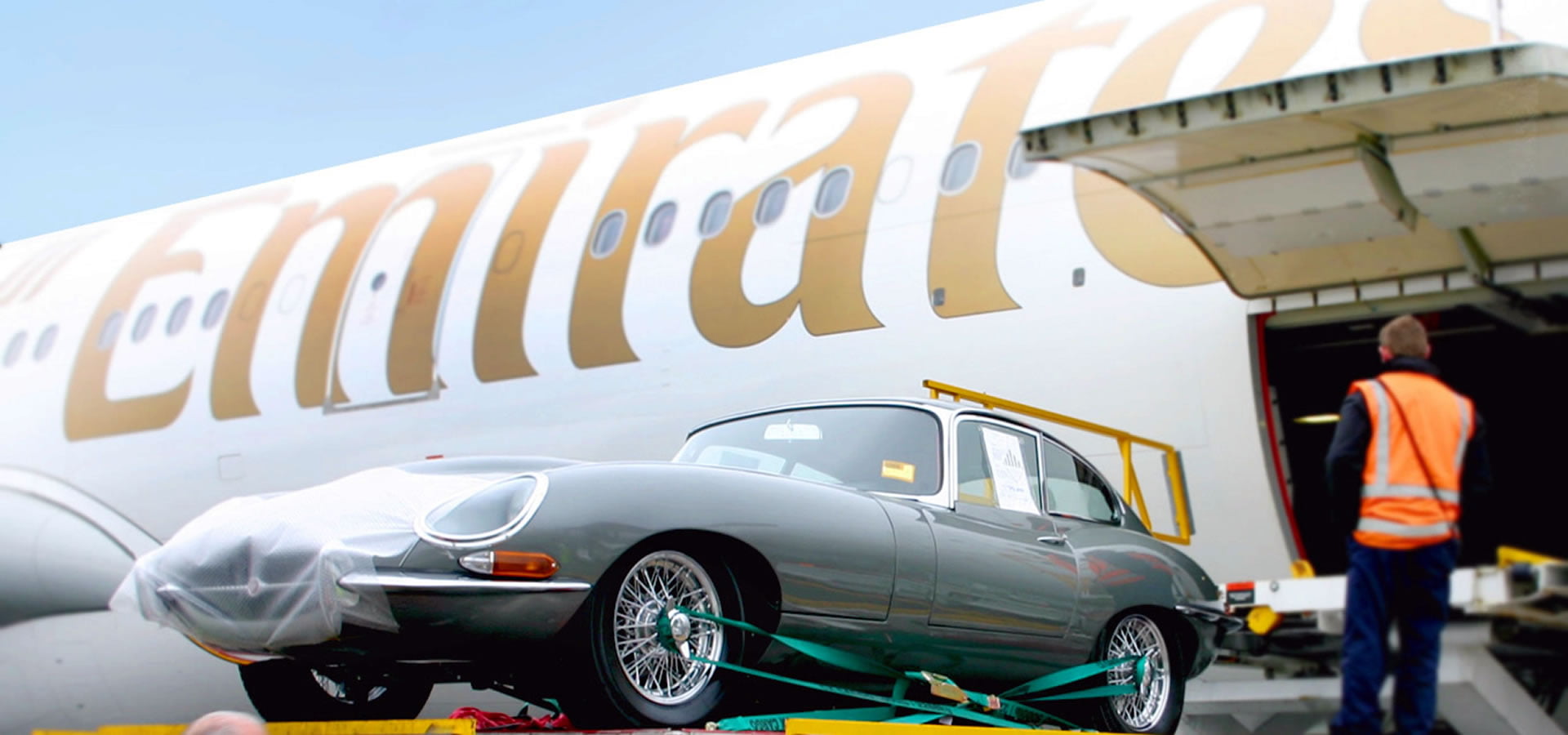 Classic car being loaded into a freighter aircraft